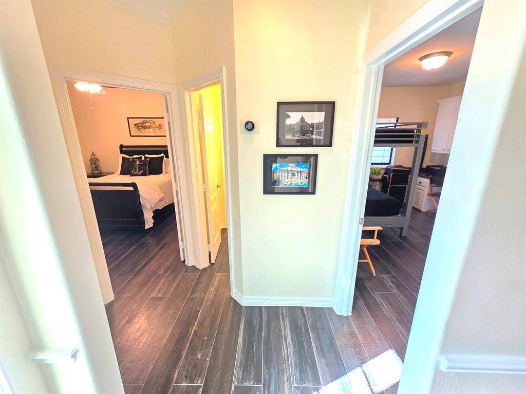 Off the entry by the front door, this leads to the two secondary bedrooms and bath