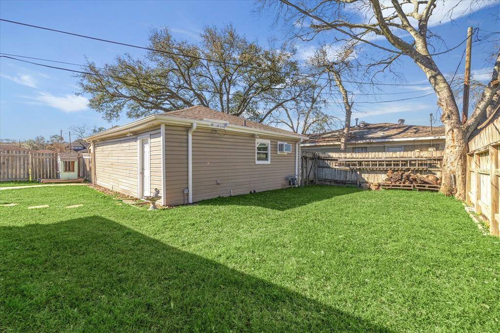 What a backyard! Double car garage is fully insulated and features shaded wide driveway offering ample parking and space for kids to play. Air-conditioned workshop with utility sink and fridge located at the back of the garage.