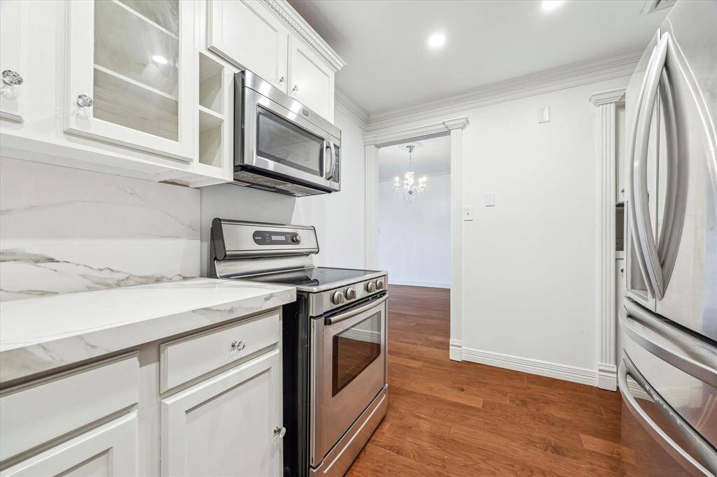 Kitchen with stainless steel appliances.