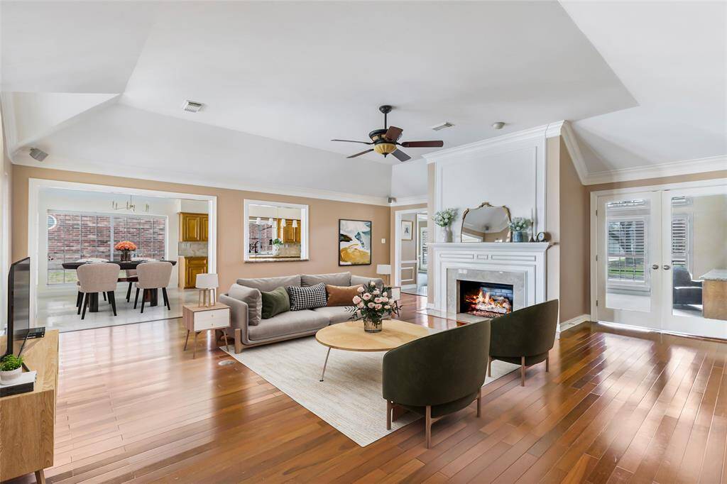Living room photo, virtually staged. Very large and open room...