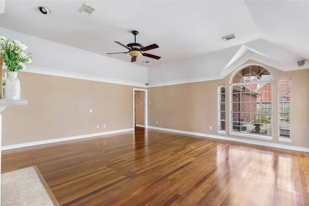 Gorgeous fireplace featuring the very large living room with HIGH ceilings