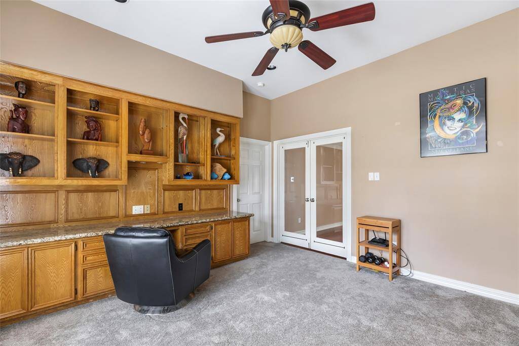 View of the living room from the entrance to the primary bedroom...