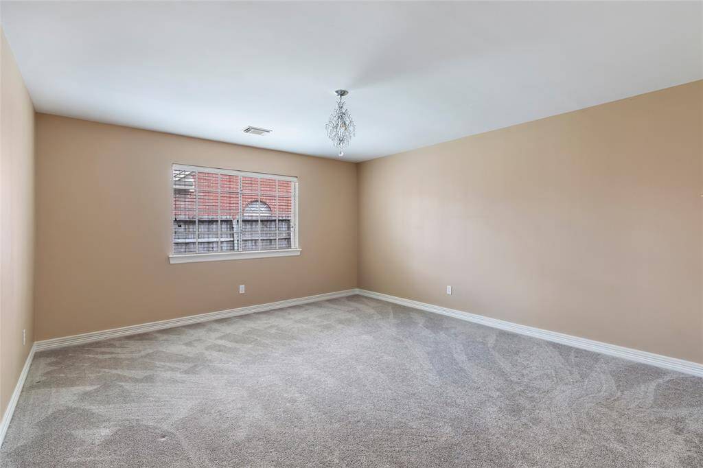 Half bathroom located off the living room for guests...