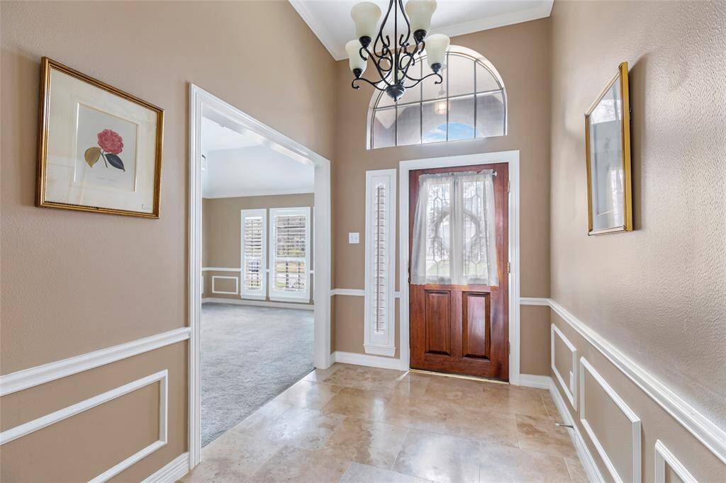 Solid wood door and beautiful travertine...