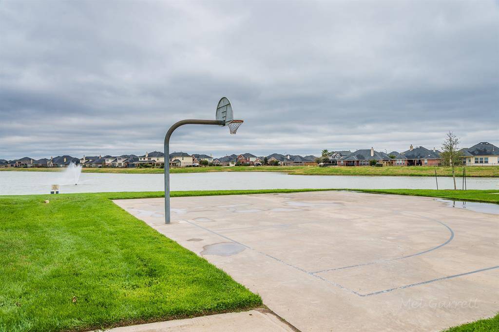 Basketball Court with lake views