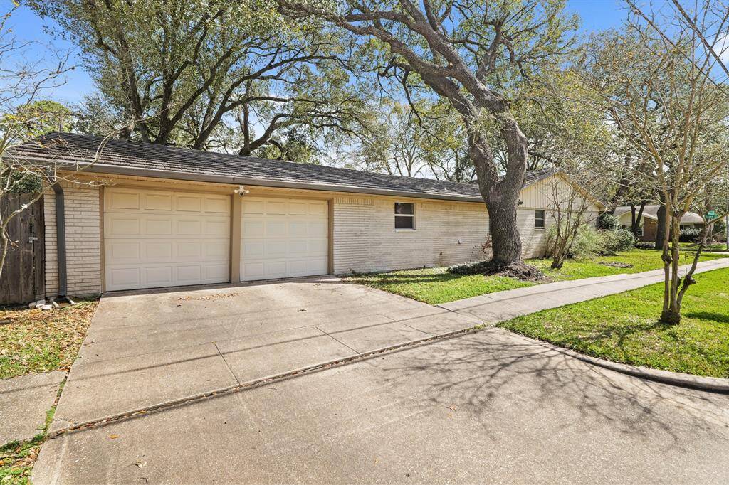 nLarge Two-Car Garage with Side Entry! Ample driveway space and a recently replaced garage door opener make parking easy and secure.