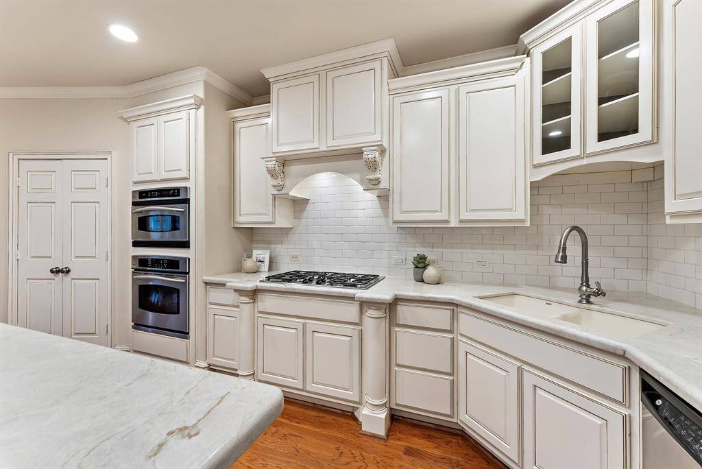 The kitchen offers ample storage seamlessly integrated into its design.