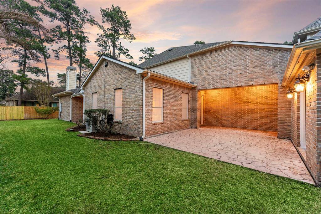 Expansive yard complemented by a spacious covered patio offers flexible space for outdoor gatherings or additional entertaining possibilities.