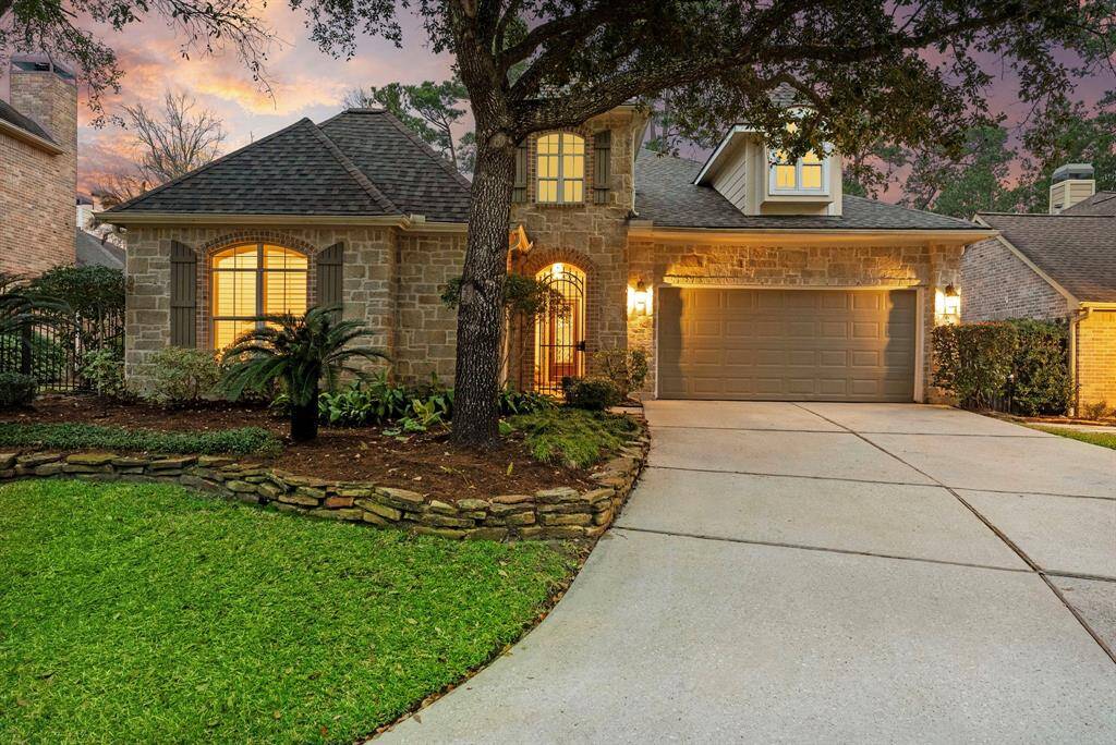 Located in the picturesque Sterling Ridge area, this stunning 1.5-story brick home features a tranquil cul-de-sac position with expansive green space. The charming gated courtyard entry exudes elegance. The double-wide driveway provides access to an oversized two-car garage. Enjoy low-maintenance living in an amenity-rich neighborhood with nearby trails, parks, and retail options.