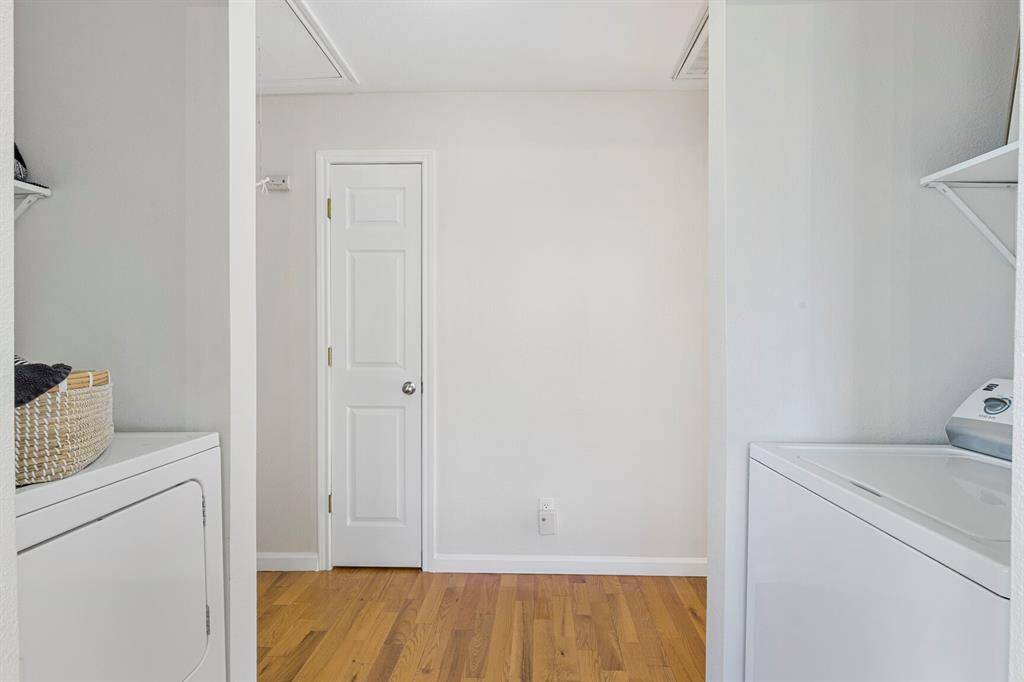 Convenient utility area near bedrooms for easy access.