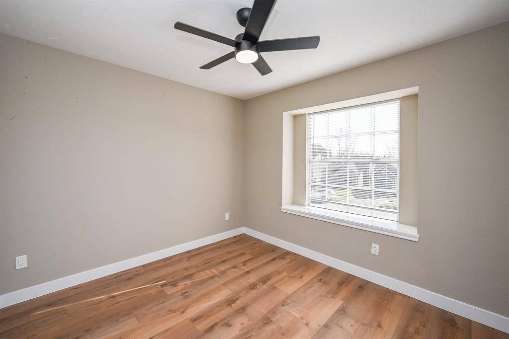 Natural light floods the room, highlighting the clean lines and neutral palette.