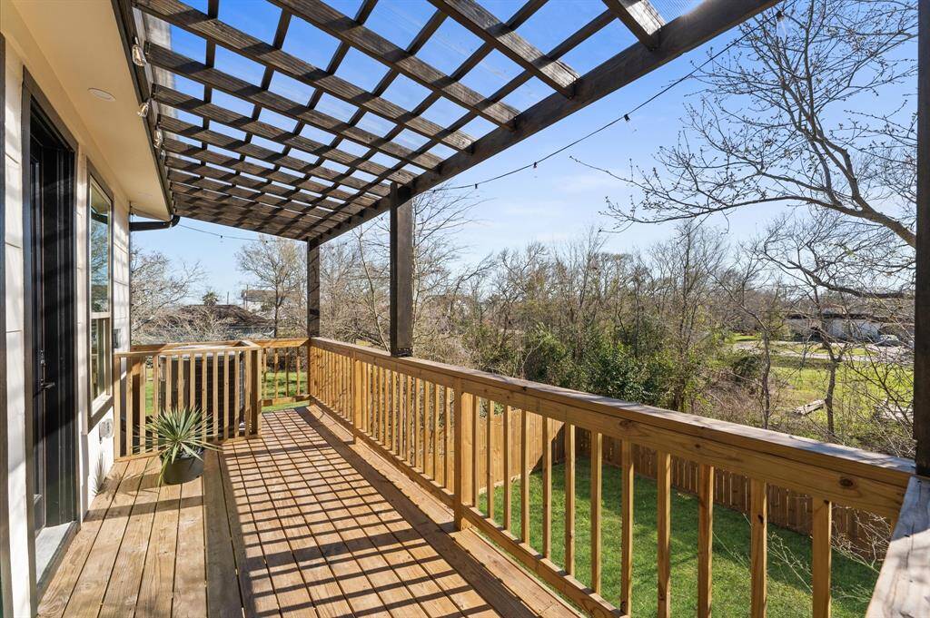 Charming balcony featuring a shaded area, perfect for relaxing or entertaining outdoors. Enjoy the cool breeze and privacy in this inviting space