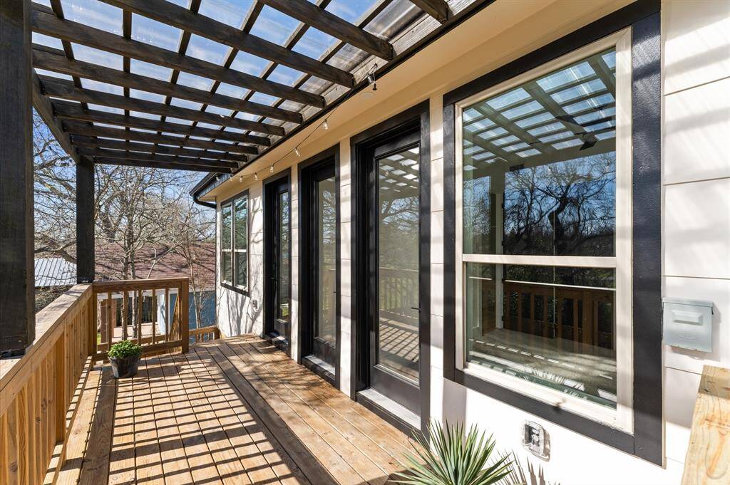 Both the front and rear balconies provide tranquil outdoor spaces with serene views.