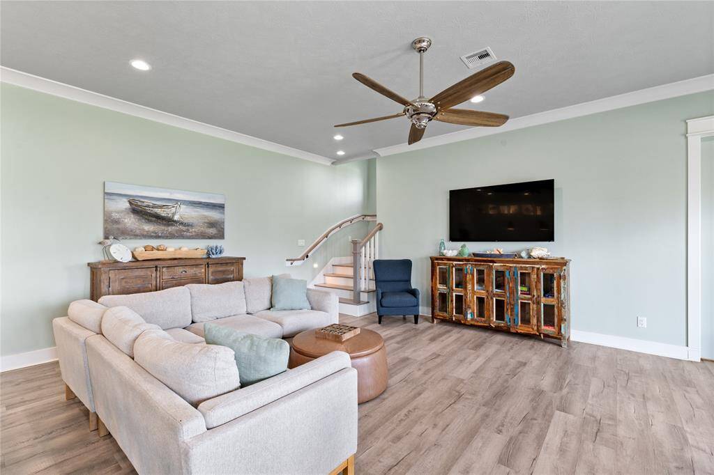 This space is ideal for gathering with loved ones and enjoying the serenity of beachfront living.