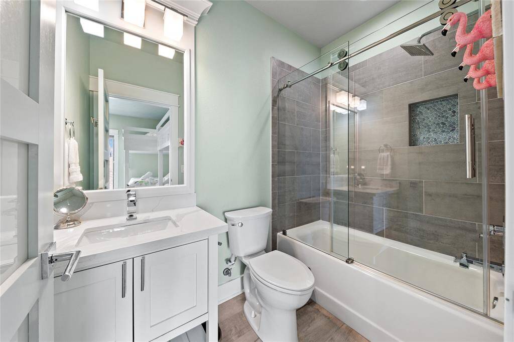 The ensuite bathroom adds a level of convenience and privacy, creating a perfect space for rest and relaxation.