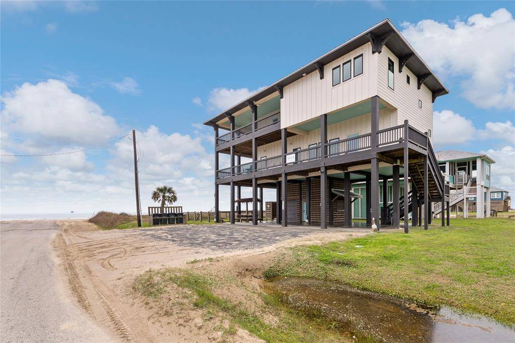 Enjoy the privacy of a fenced-in yard while hosting unforgettable gatherings on the spacious wraparound decks. Whether it's a weekend getaway with family or a lively vacation rental, this home offers the perfect setting for making lifelong beachside memories.