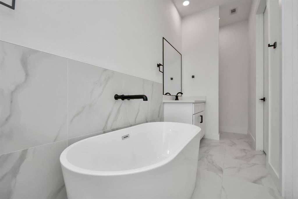 Unwind and rejuvenate in your gorgeous bathtub.