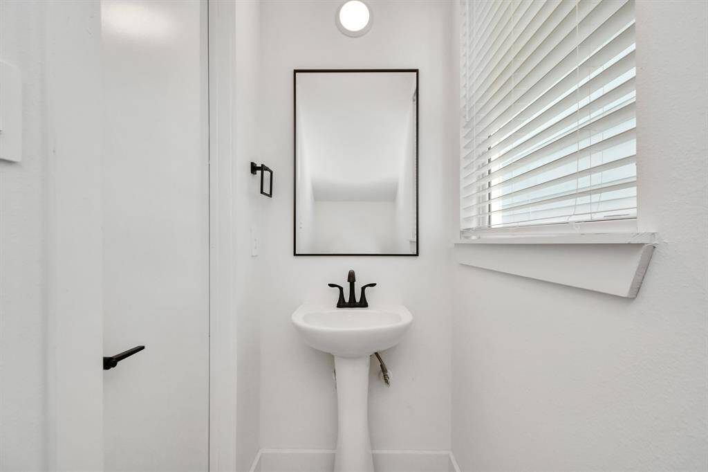 Convenient half bath. A handy addition for guests and daily convenience.