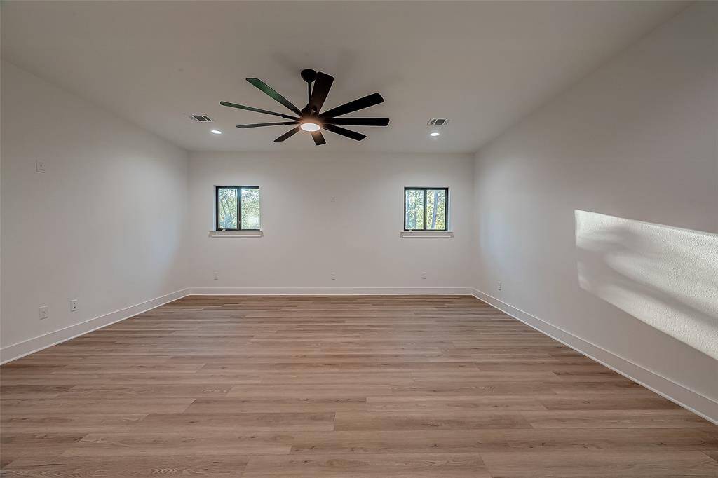 Spacious game room perfect for movie nights!