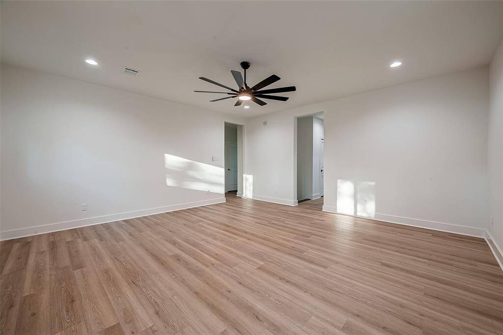 The game room is next to two separate bedrooms that share a full bathroom