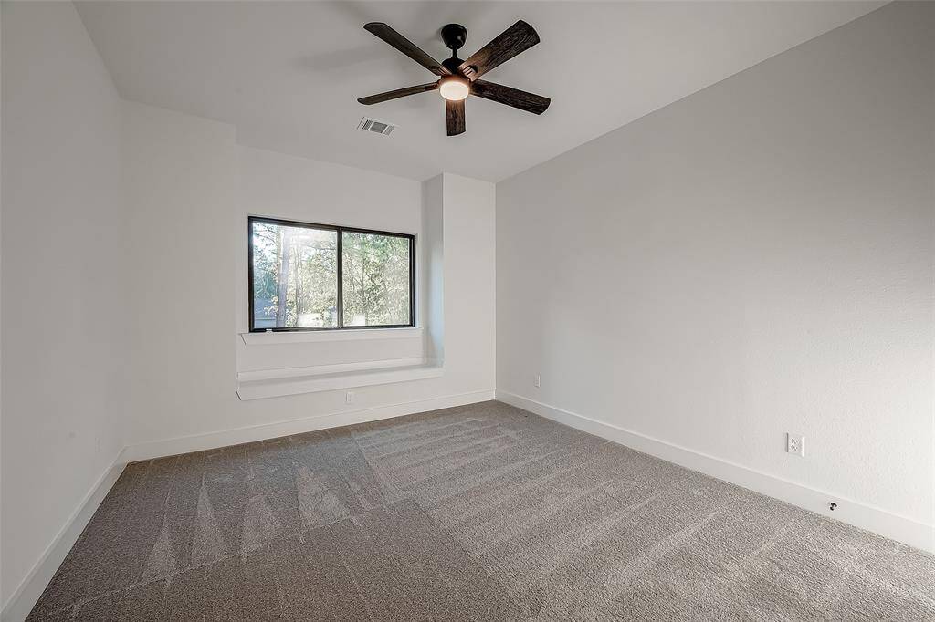 Upstairs bedroom with built-in sitting area