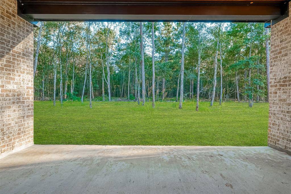 View of the backyard (Sod will installed prior to closing so that it is fresh for the new owner)