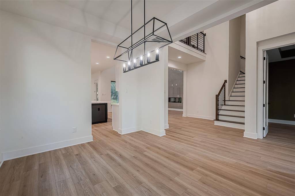Dining room flowing to the kitchen and living area