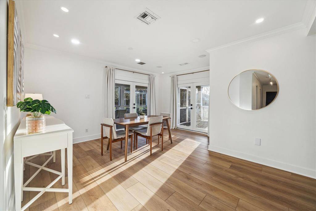 Large dining area with two sets of french doors