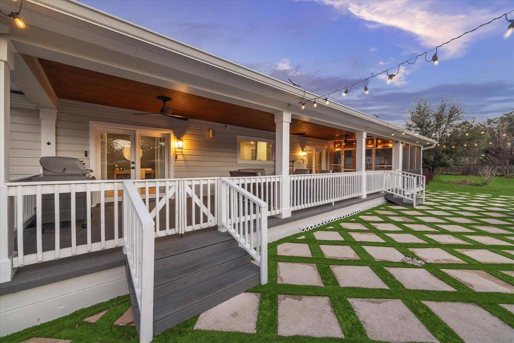 Turf w/ pavers along backyard & firepit area all installed by current owner