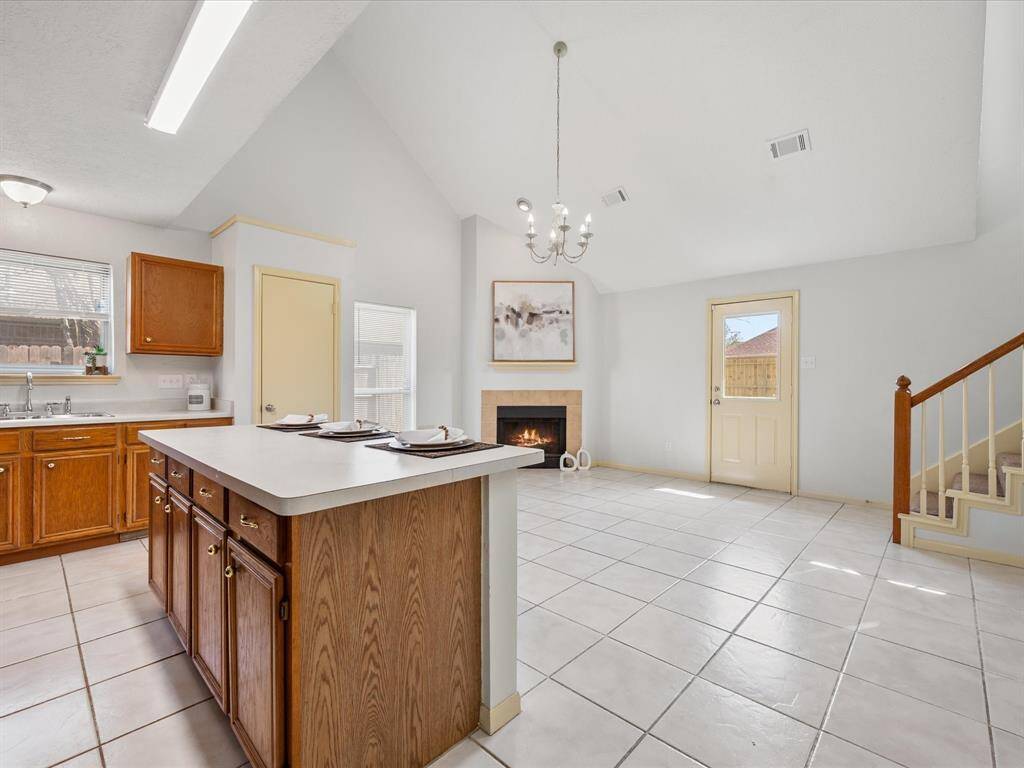 Open kitchen that flows to a second living space.
