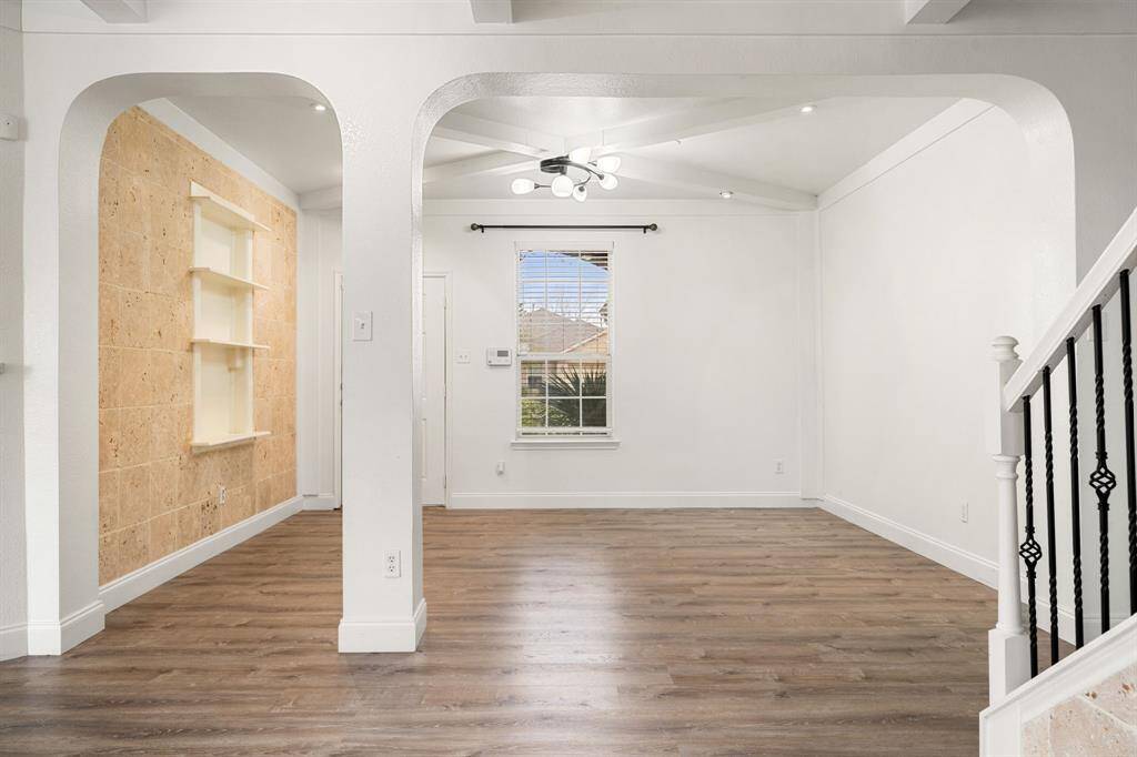 Front Foyer of home, perfect for an office space or formal dining area.Note: Door & Stairway is Feng Shui Compliant. View #1
