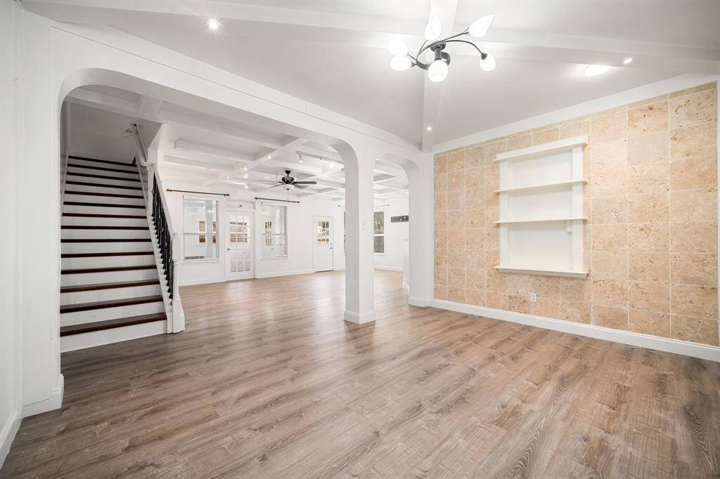 Front Foyer of home, perfect for an office space or formal dining area.Note: Door & Stairway is Feng Shui Compliant. View #2
