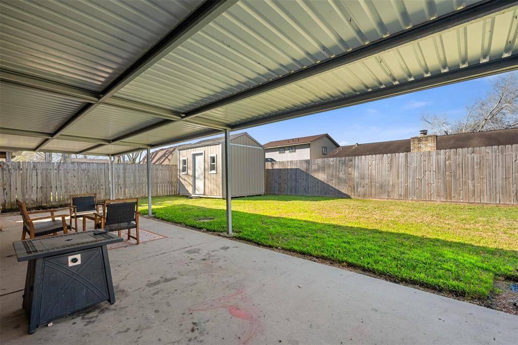 Big backyard with large patio