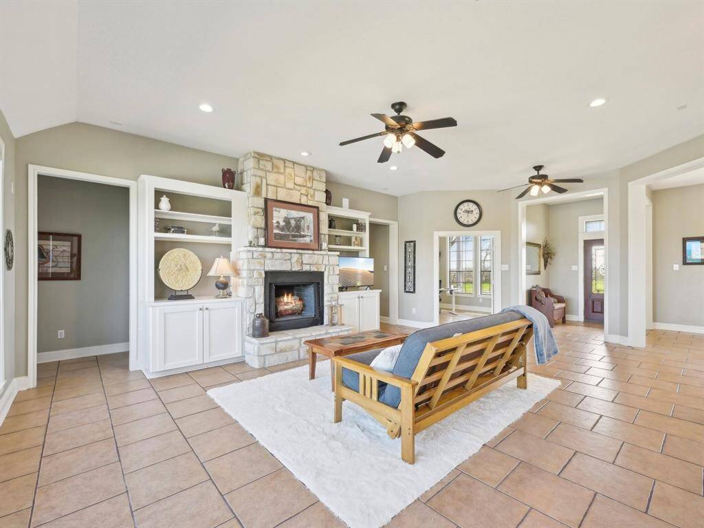 The Family Room has a gorgeous stone fireplace. It's perfect for warming a chilly night or setting the mood for a date night in!