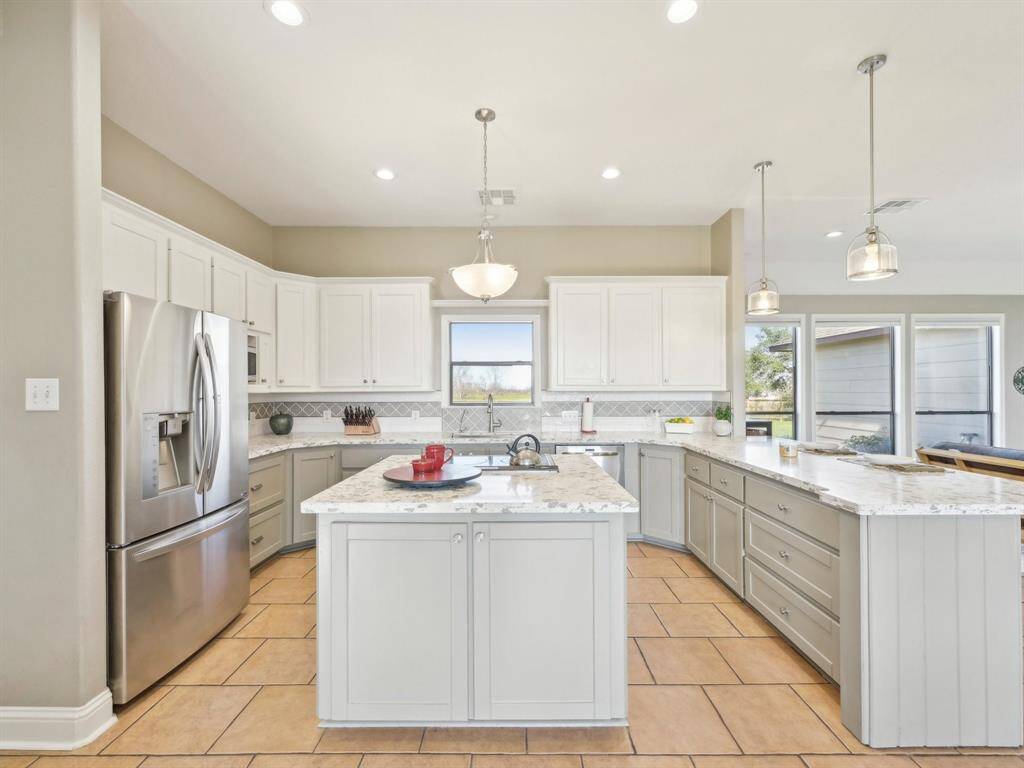 The refrigerator conveys with the property!