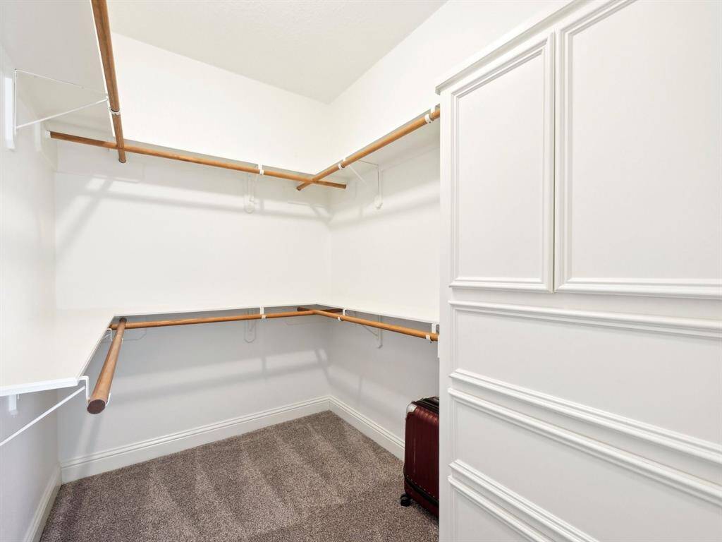 The walk-in closet has ample room for your clothing!