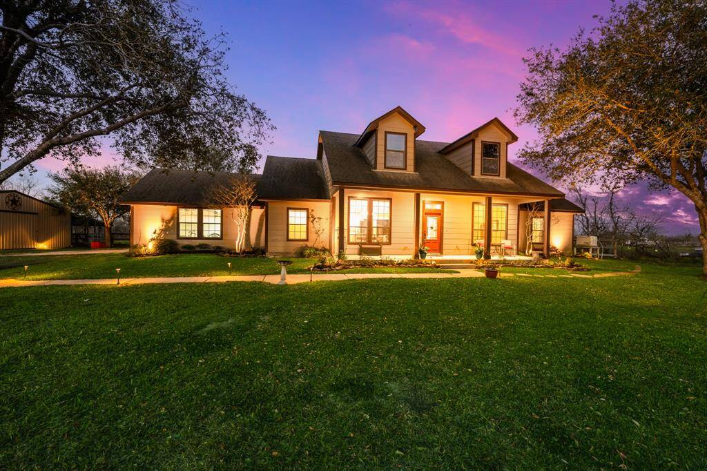 This home has a fantastic covered porch to sit and enjoy a cool beverage.