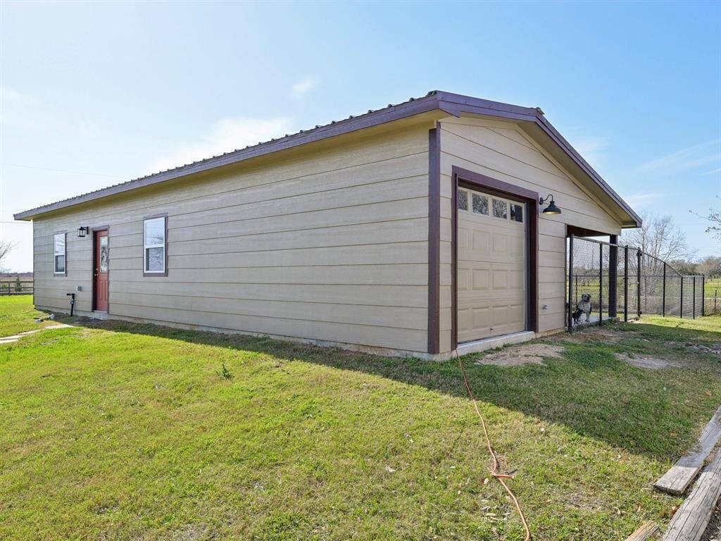 The dog care building is new. Pet owners or breeders are sure to love it. It can also be easily converted into separate quarters.