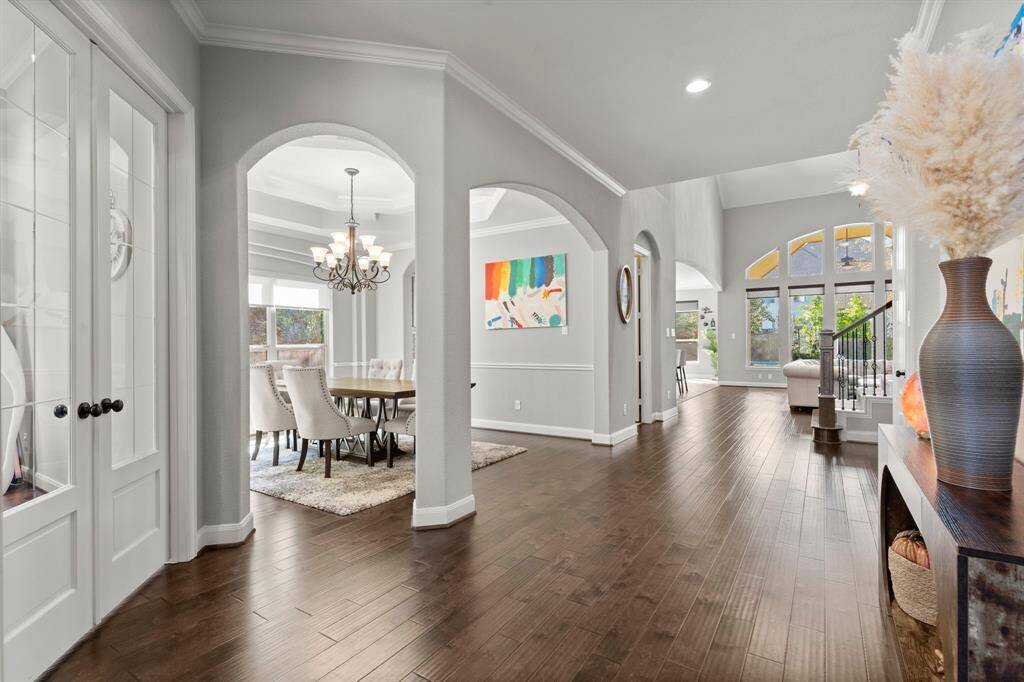 Formal entry way with the home office to the left followed by the formal dining.