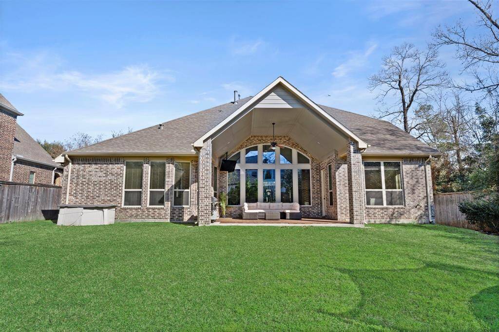 Large fully fenced backyard.