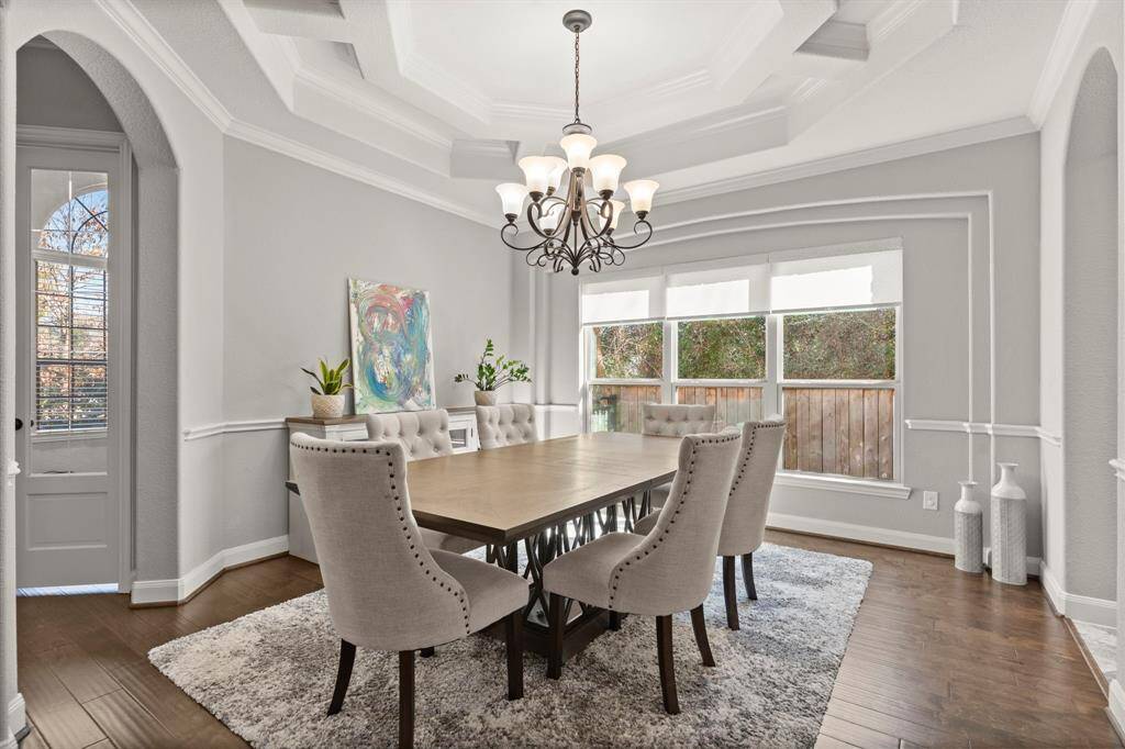 Formal dining room with beautiful ceiling detail.