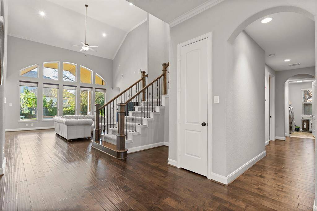 View into the formal living and entrance to the second floor.