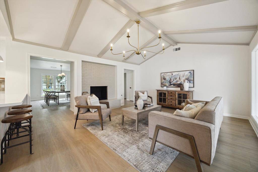 VIEWS OF THE HIGHLY DESIRABLE OPEN FLOOR PLAN.