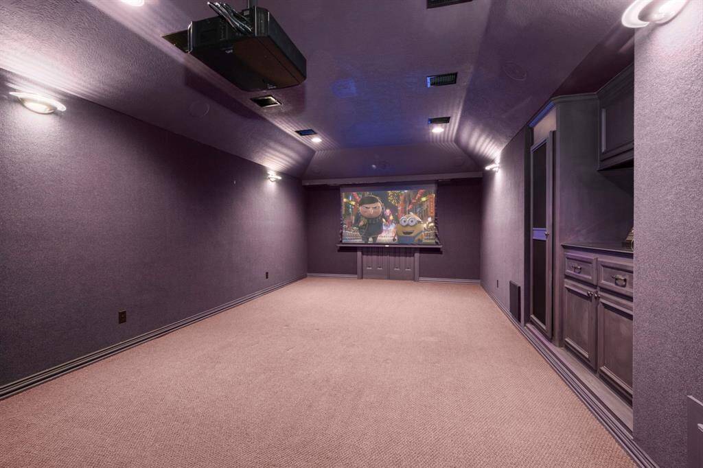 Theatre room comes with the media equipment included.