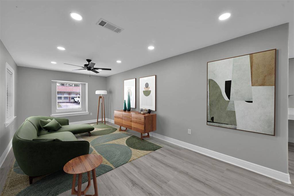 Towards the front of the home you'll find the spacious living room, with ALL NEW Insulated/Low-E windows providing abundant natural light.*Digitally Staged