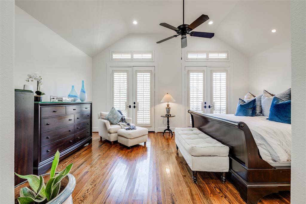 Huge Primary bedroom to front of the house with high ceiling, sitting area, plantation shutters, ceiling fan, new LED lights, recently painted