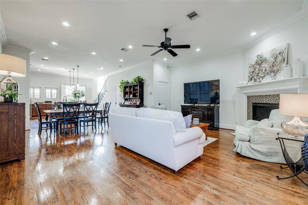 Large Living Room with corner gas fire with tile surround, new LED lighting, lots of storage & half bathroom