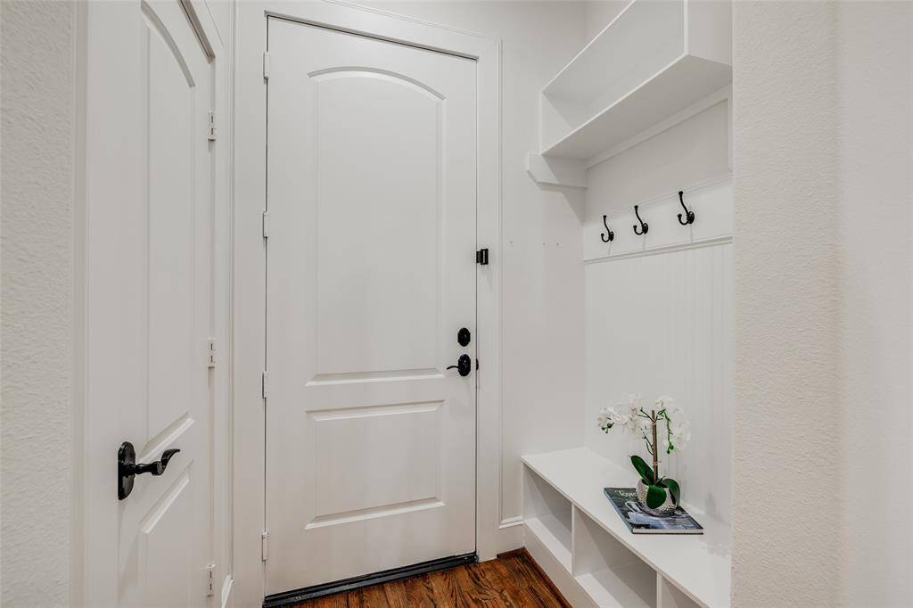 Lots of storage throughout the home,  mud room at entrance to store jackets & school bags