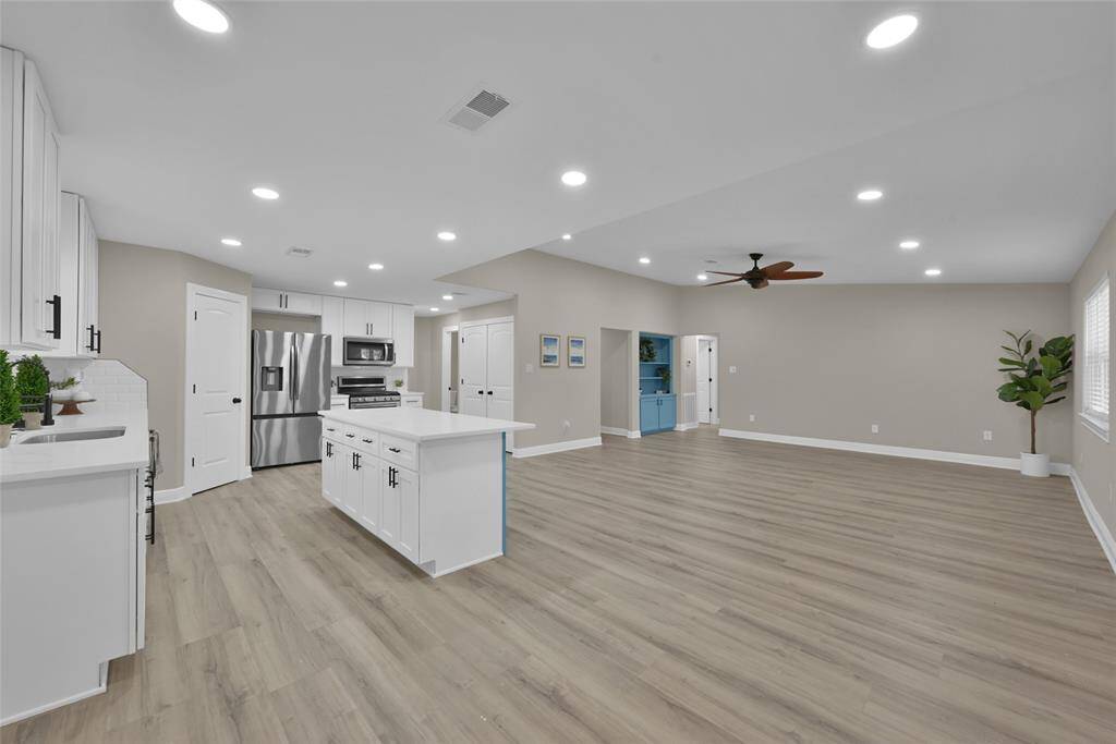 The dining room has a bright and airy atmosphere thanks to the open floor plan.