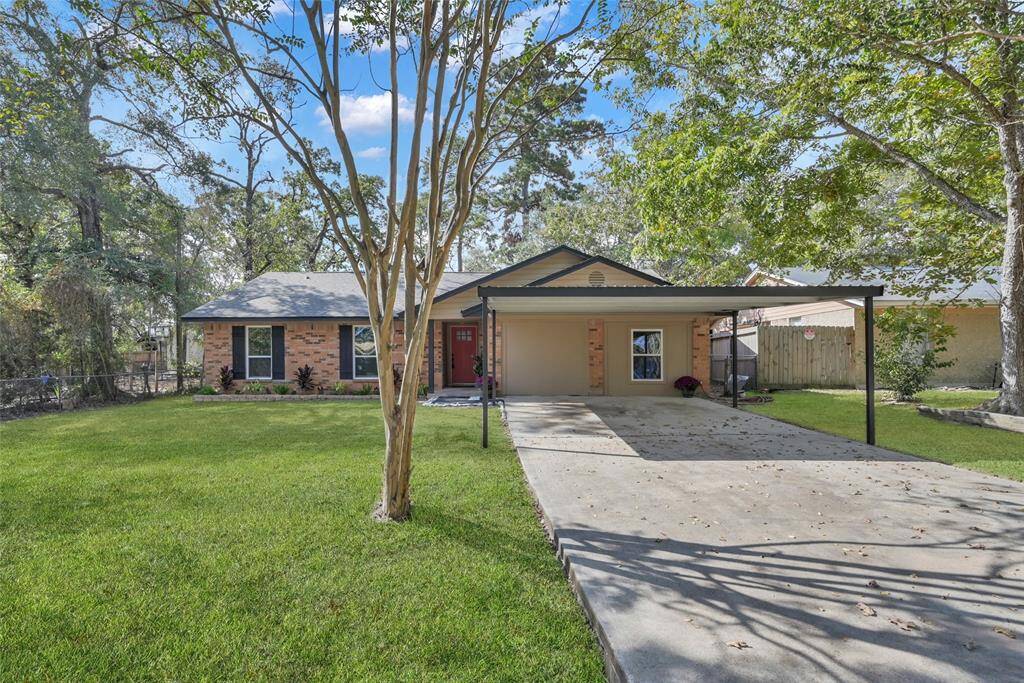 New Paint, Soffit Lighting, wrapped tile front porch with a warm inviting front door. The lush landscaping with beautiful stone & rock borders completes the inviting entrance.